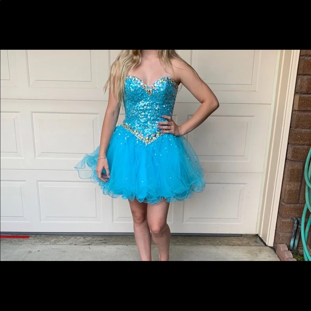 Couture dresses. Worn once.  Adjustable size
